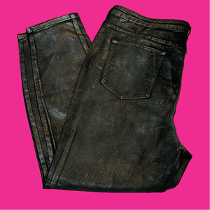 - NWT women’s shiny LOGO skinny jeans 24w